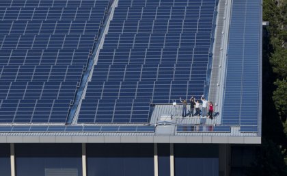 Solar panels - like these at UQ - are being installed globally at a rate of a gigawatt every week, almost as much the total amount installed during the 20th century.